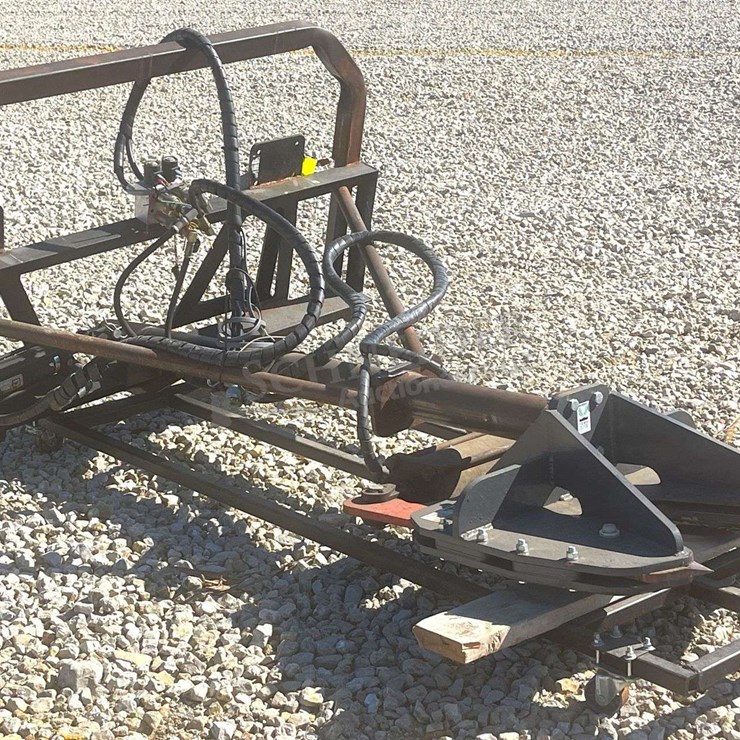 Skid steer hydraulic rotating high reach tree shear, from the estate of Dr. Ken Buchmann