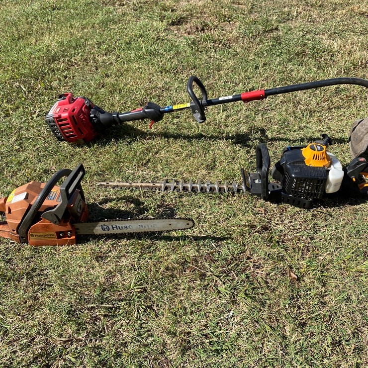 #98 • #212 • Husqvarna Gas Powered Chain Saw; PoulanPro Gas Powered Hedge Trimmer; Troy-Bilt 2-cycle String Trimmer