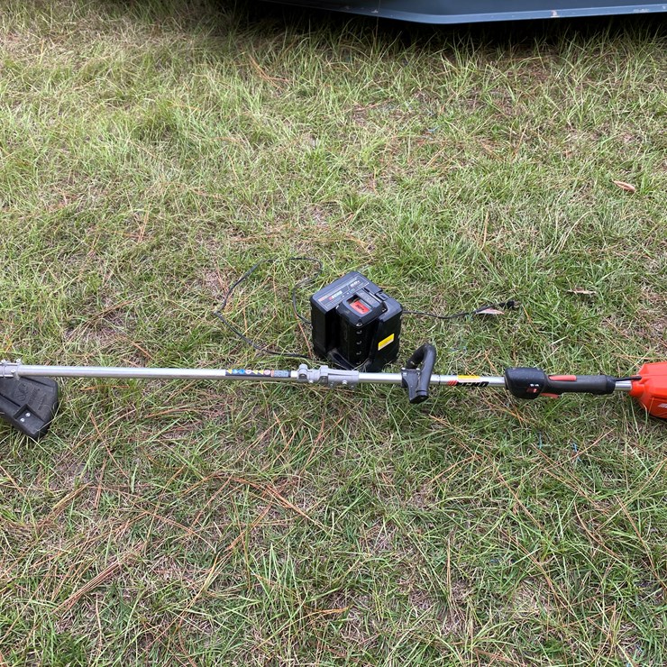 #69 • #177 • Echo 58 V electric string trimmer with charger and two batteries.