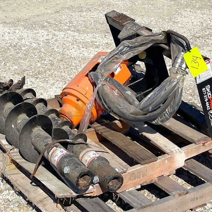 Unused Skid Pro skid steer auger w/ 2 augers, from the estate of Dr. Ken Buchmann