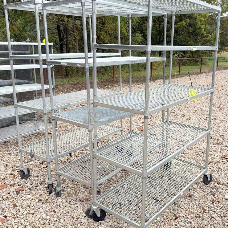 3 metal rolling shelves up to 4' wide