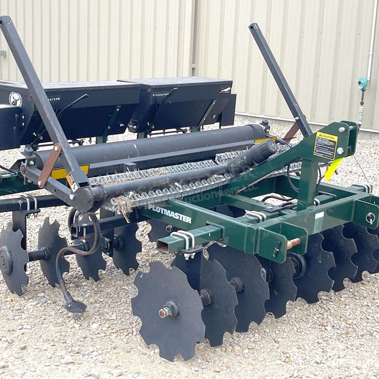 Unused Plotmaster 6' 3-pt. food plot disc seeder, from the estate of Dr. Ken Buchmann