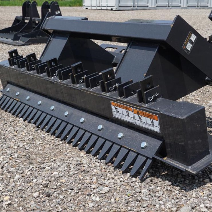 #1379 • New! Wolverine Skid Steer Ripper Attachment